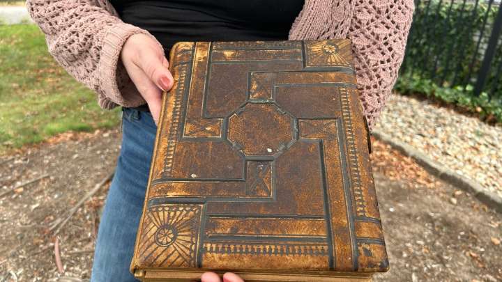 CT woman searches for the owner a vintage photo album dating back to the 1800s