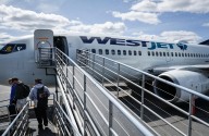WestJet flight attendants seek to address alleged unpaid work in new agreement