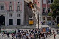 Portuguese investigators search for cause of Lisbon streetcar crash that killed 16