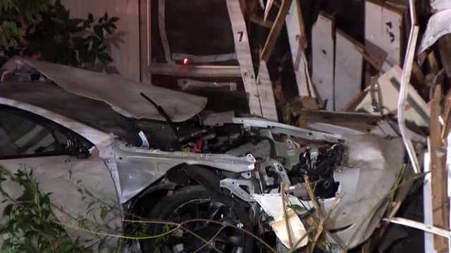 Car crashes into home in Manchester
