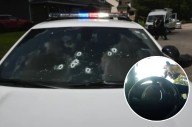 Video shows murder suspect shoot out IMPD squad car windshield before being killed by officers