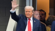 Trump attends the US Open as Rolex's guest despite Swiss tariffs. Mixed cheers and boos greet him
