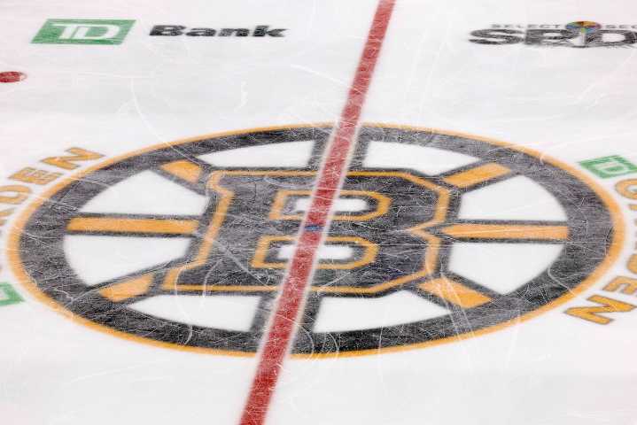 Bruins make first round of roster cuts