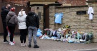 Hugs and tears in the street as mourners gather to remember Ricky Hatton