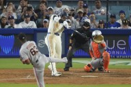 Ohtani hits 53rd homer to tie for NL lead as Dodgers top Giants 7