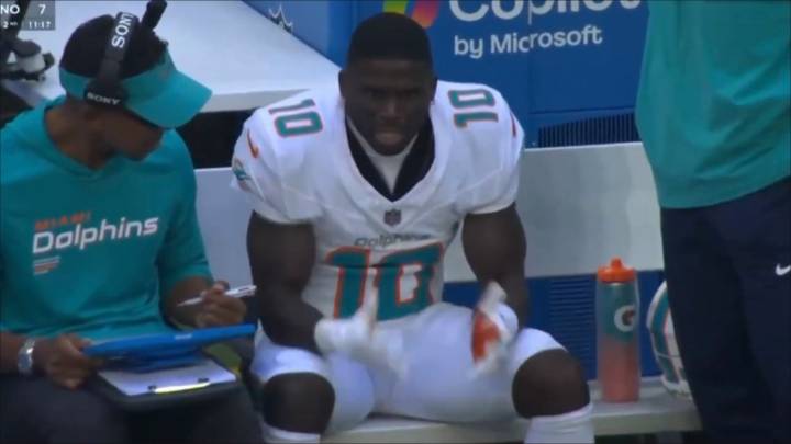 Tyreek Hill spotted 'crashing out' on Miami Dolphins sideline with star left fuming during Colts game