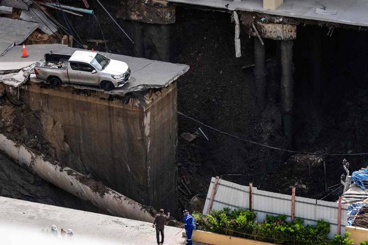 160-Foot Deep Sinkhole Forms on Busy Highway Swallowing Up 3 Vehicles