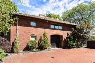 Built in 1908, This Former Carriage House has a Surprise Mid