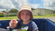 Toddler dead after being found unresponsive in pond at Queensland caravan park