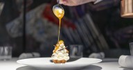 Emeril's tasting menu restaurant is in its own league. Here's what dining is like today.