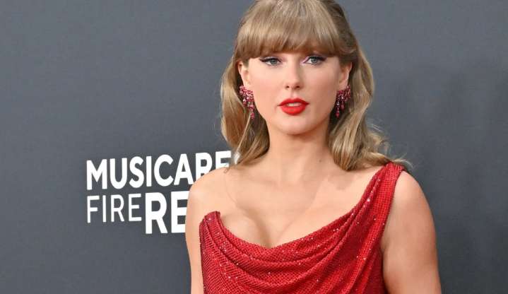 Taylor Swift hid behind a 7ft 'bulletproof' screen to watch fiance Travis play football amid Charlie Kirk copycat fears