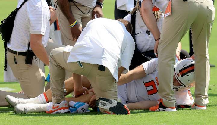 Syracuse quarterback Steve Angeli leaves Clemson game on crutches and in a protective boot