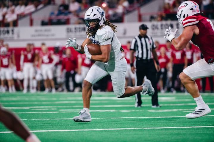 South Dakota football runs over UNC, but needs OT to beat the Bears 24