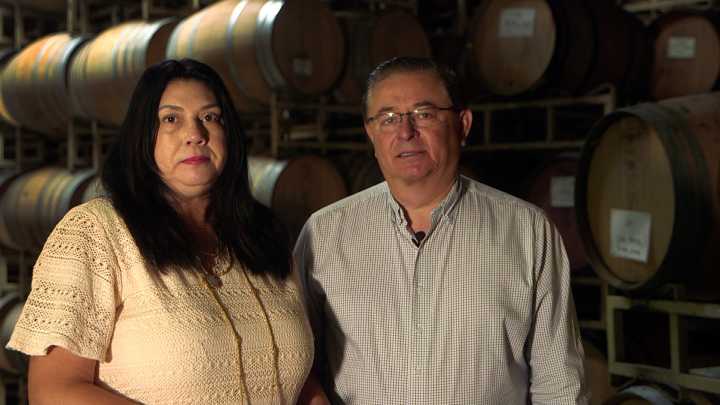 Latino couple barrels through life of family and wine