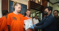 Two Brits facing death penalty in Bali drug plot, paraded with cocaine haul