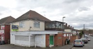 Council rejects move to build flats above shop