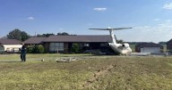 Plane runs off runway, crashes into house in Mayfield