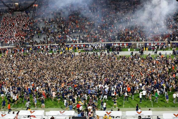 19 people injured after field rush, altercation following Virginia's win over Florida State