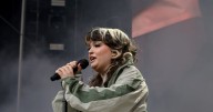 Lola Young says she is 'doing OK' after collapsing mid