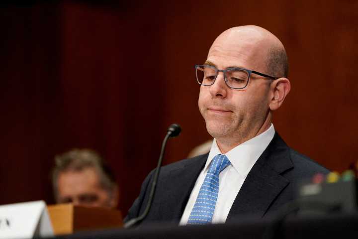 Trump advisor narrowly confirmed for key Federal Reserve role
