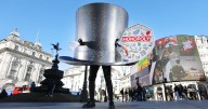 Fans chase giant Top Hat across London in real-life Monopoly game to celebrate 90 years