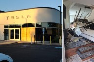 Woman crashes through front of Tesla dealership