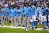 Titans coach Brian Callahan hands off play