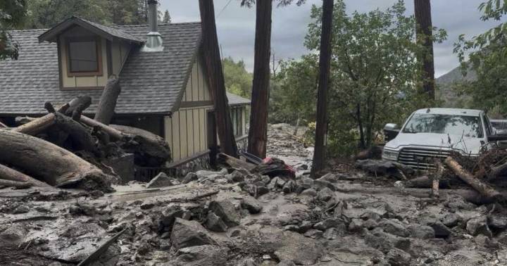 Mudslides trap drivers, bury roads and damage homes in southern California