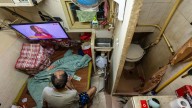 Hong Kong lawmakers pass bill to ban substandard tiny apartments