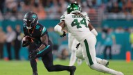 Dolphins’ Tyreek Hill carted off MNF field with leg injury