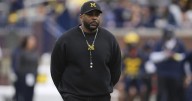 Michigan coach Sherrone Moore says Biff Poggi will lead team during his upcoming 2