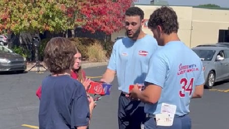 Larry Nance Jr. signs an autograph while at Swensons to benefit APS
