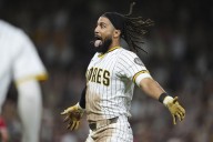 Fernando Tatis Jr.'s 10th-inning sacrifice fly lifts the Padres to a 4