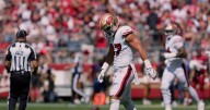 49ers' Nick Bosa exits win vs. Cardinals with knee injury, gives thumbs