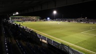 National League match abandoned as medics rush onto pitch to treat two players after sickening collision