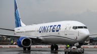 United grounds all planes across US & Canada over 'tech issue' with American Airlines passengers also hit with delays