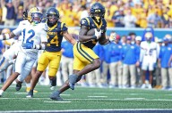Edwards' short TD run in overtime leads West Virginia over Pittsburgh 31