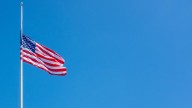 Why are flags at half-staff in Washington?