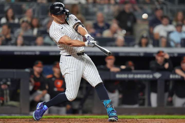 Yankees remain tied atop AL East after Giancarlo Stanton, Aaron Judge pummel Orioles ace