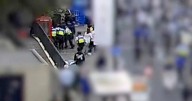 Moment 'armed cosplayer' is tackled by cops outside Chelsea match after spotting 'gun in holster'