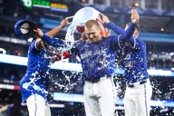 Daulton Varsho's grand slam awakens Blue Jays offence, setting up crucial final weekend