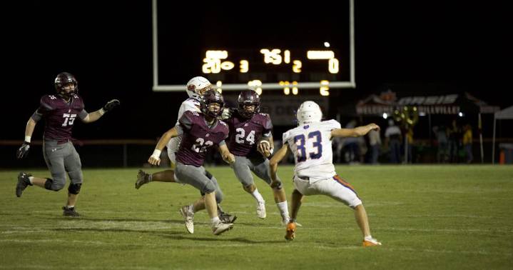 Red Devils' run game and defense stymies Bearcats