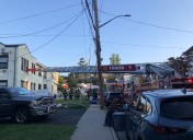 Large FDNY response at Staten Island home; ladder extended to 2nd floor