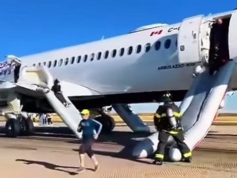 Slides used after Toronto-bound Air Canada flight returns to Denver