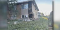 No injuries after car slams into Colorado Springs apartment building