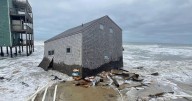 Another beachfront stilt house collapses into the surf on the Outer Banks