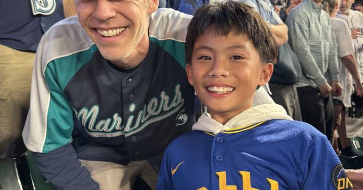 Random act of kindness: Mariners fan gifts historic ball to young stranger