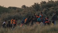 How France, Italy and the US are dealing with their migrant crises