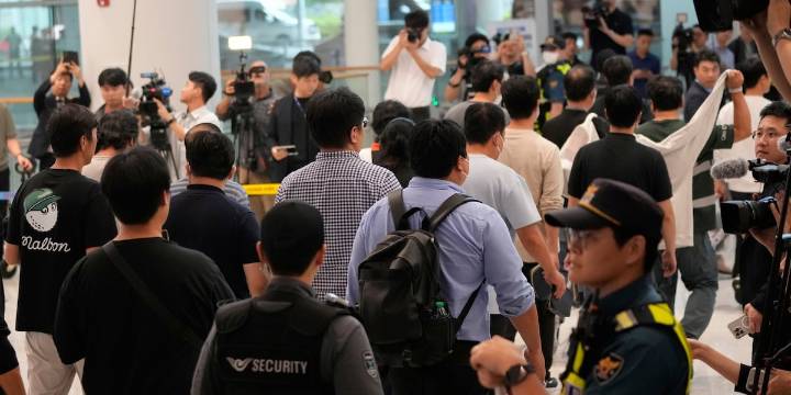 South Korean workers return home after days of detention in Georgia following immigration raid