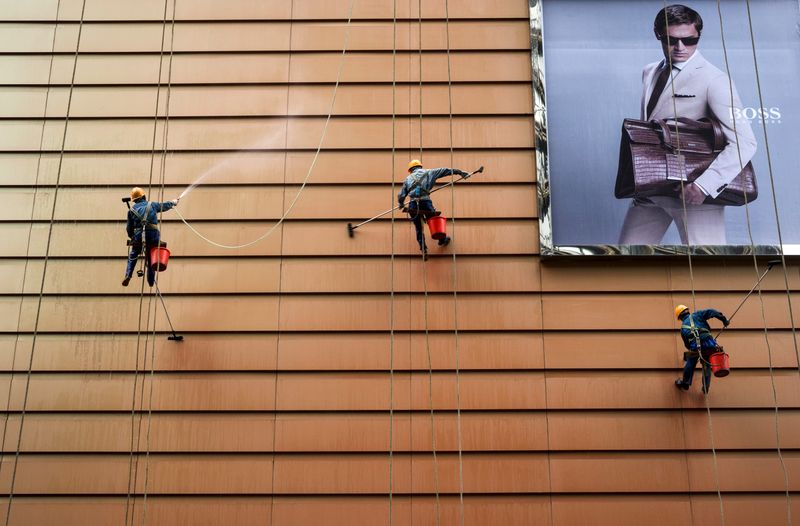 China's service activity growth moderates, private PMI shows